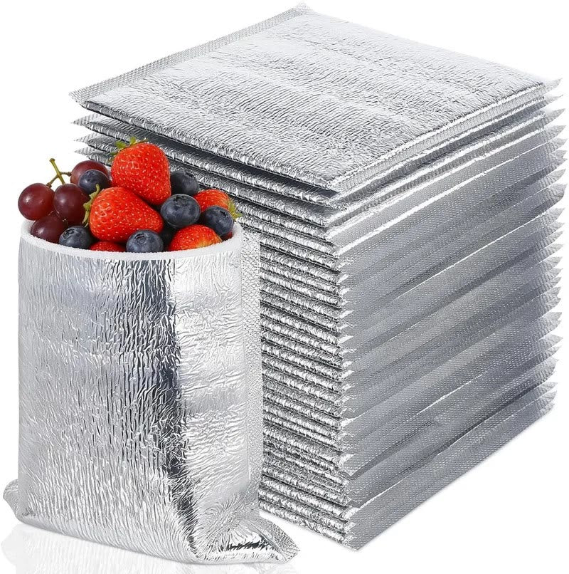Fundas térmicas pack x10: pila de fundas y funda con frutas